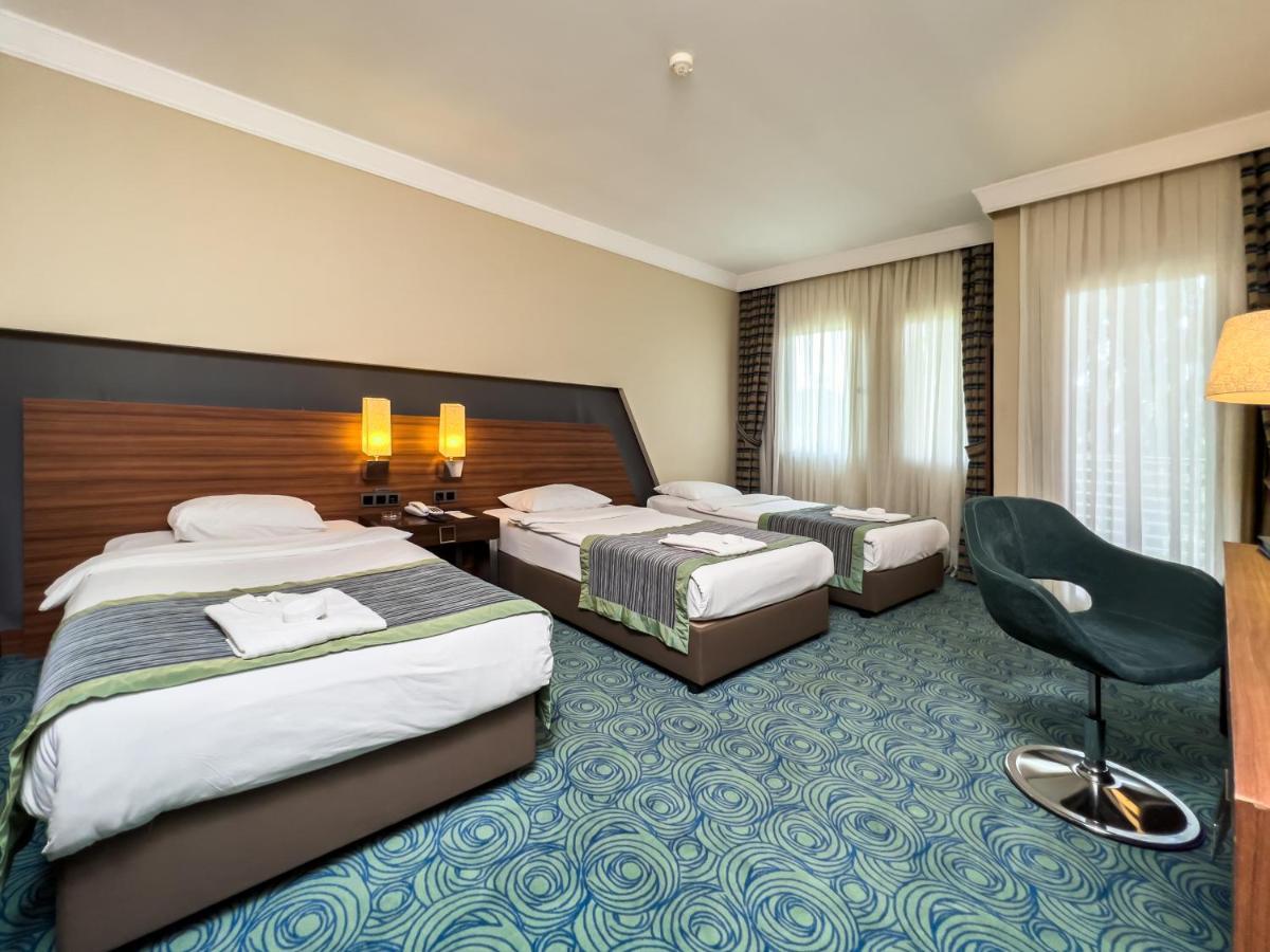 Spa Hotel Colossae Thermal Karahayit  Buitenkant foto A room at the hotel
